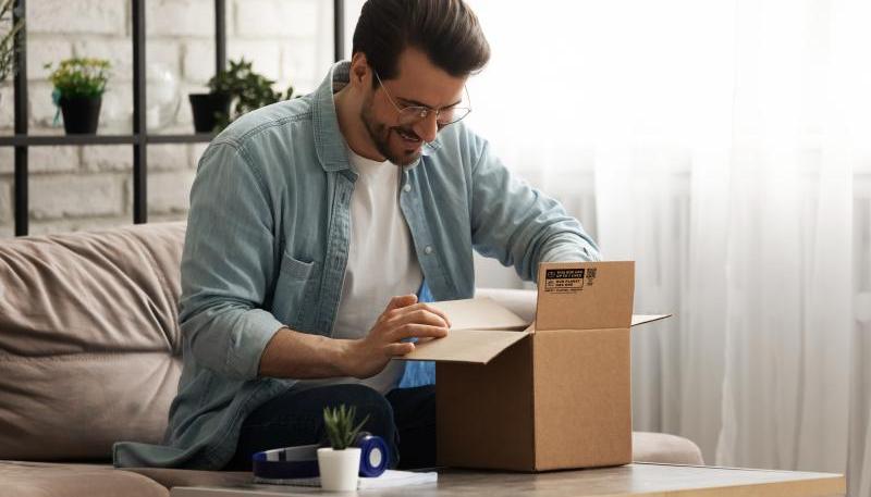 Man opening a box